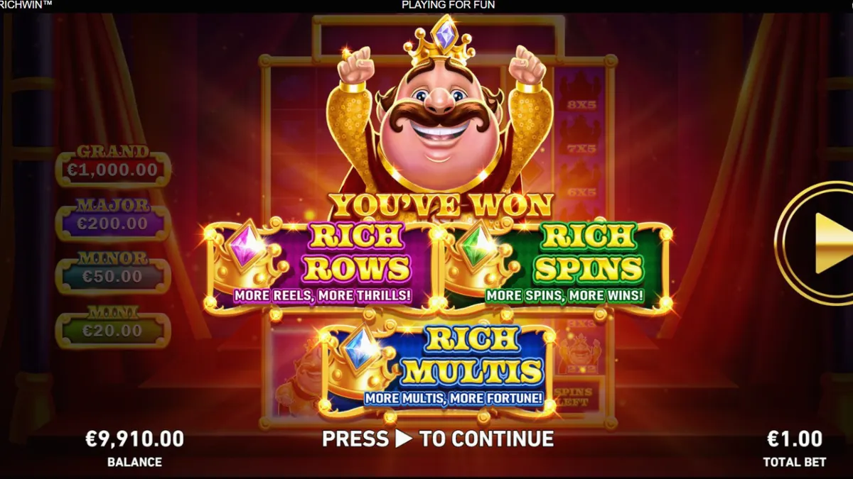 King Richwin slot game interface na may mga makukulay na simbolo at medieval theme.